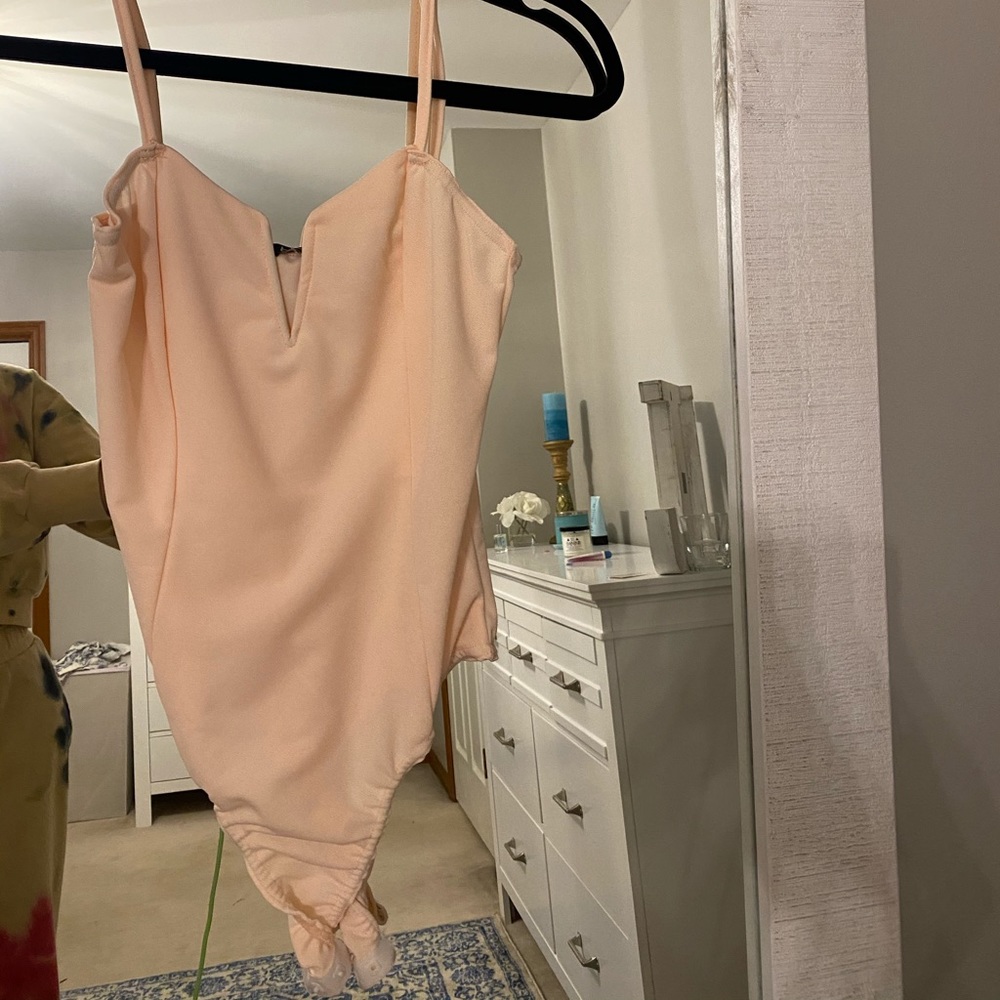 pink bodysuit